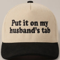 Put it on my Husbands Tab Trucker Hat