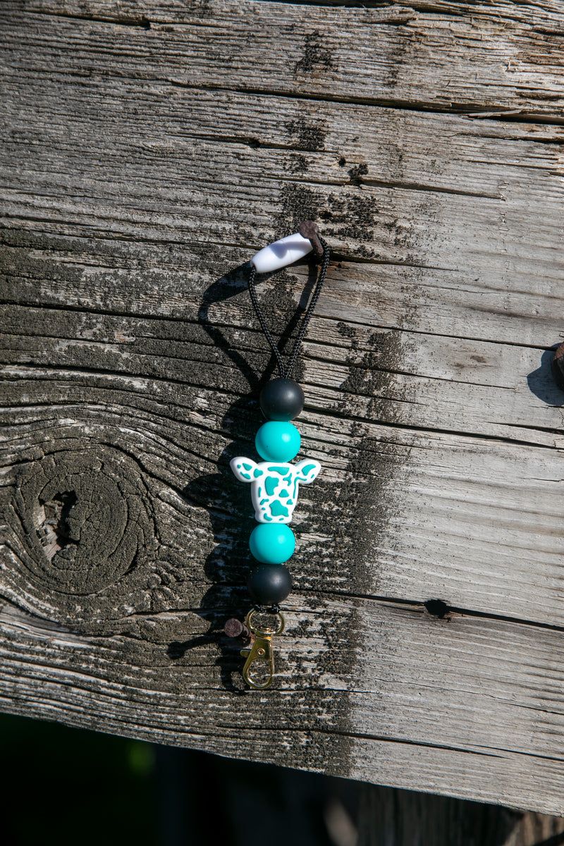 Teal Cow Print Car Freshie Hanger